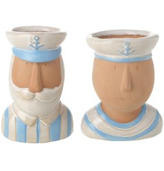 An assortment of 2 sea captain pots. Each has a blue and white coastal inspired glaze and is wonderfully detailed.