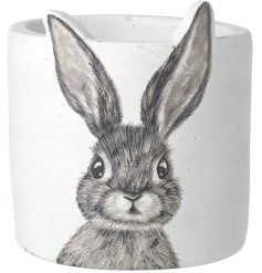 A cute Easter pot with a rabbit illustration detail.
