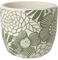 Add a delightful touch to the home with this enchanting floral pot.