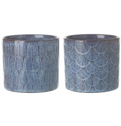 A blue ceramic pot in 2 assorted designs with a patterned finish. 