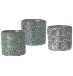 This delightful assortment of ceramic pots is sure to bring a touch of nature into any home