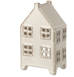 This cream ceramic house stood on 4 legs would make a great addition to the home, to be on display all year round