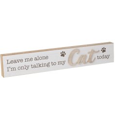 A wooden block plaque featuring a humorous quote in a rustic white and brown colour tone