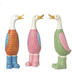 An assortment of colourful and contemporary duck ornaments, each with an engraved dotty design. 