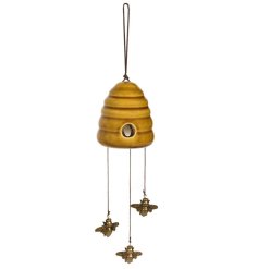 A richly coloured honey beehive with bronze flying bees. A unique wind chime for the garden. 