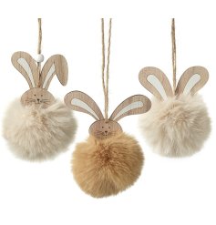 3 assorted wooden bunnies decorations with faux fur bellies. 