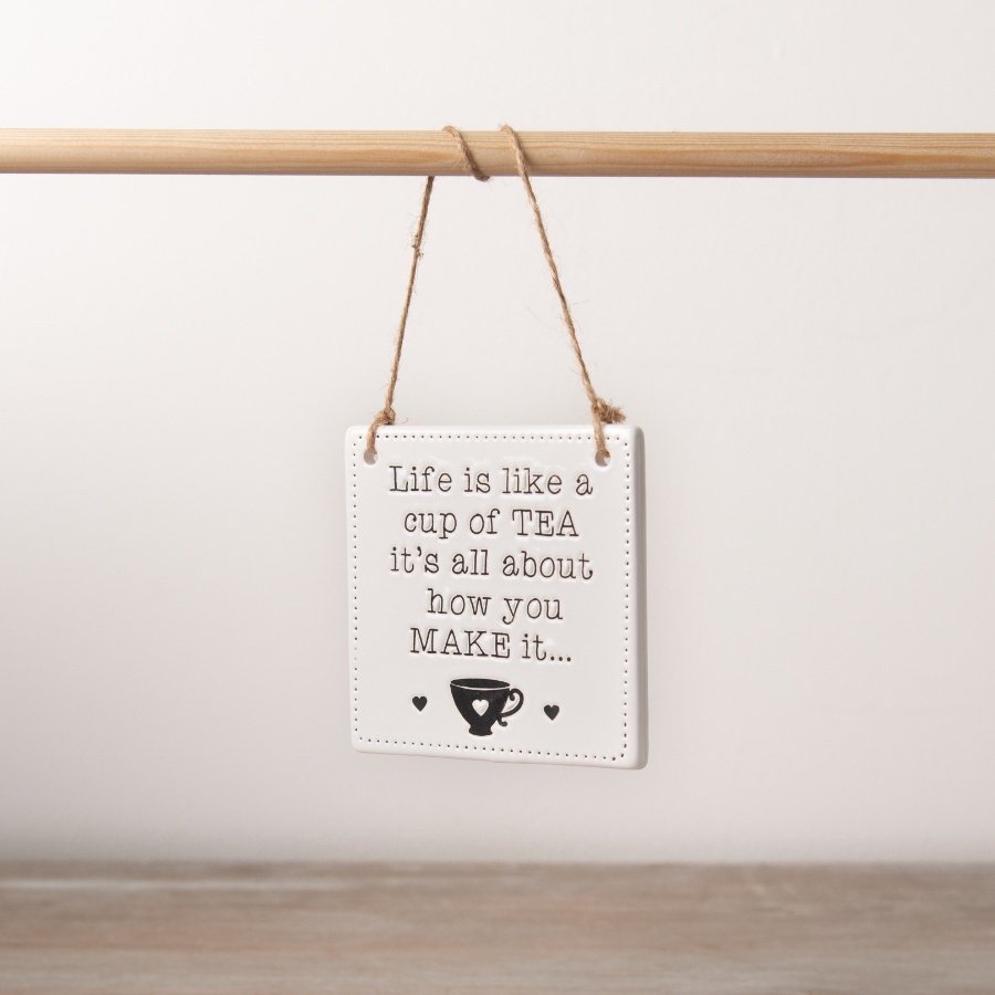 A chic ceramic sign with a charming tea slogan. Complete with a rustic jute hanger. 