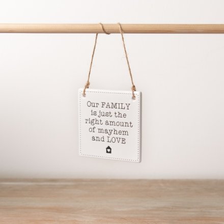 Our family is just the right amount of mayhem and love. A beautiful ceramic sign with a unique family slogan 