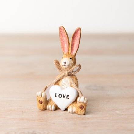 A charming rabbit decoration with a rustic jute string bow and heart detail with LOVE slogan inside. 
