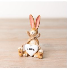A charming rabbit decoration with a rustic jute string bow and heart detail with LOVE slogan inside. 
