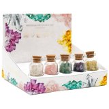 A spiritual assortment of 5 glass bottles each containing a collection of mini crystals, each with their own properties 