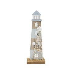 A chic lighthouse freestanding ornament in blue and neutral colour tones.