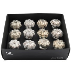 Up cycle old furniture with this assortment of 4 drawer knobs featuring silver and golden patterns. 