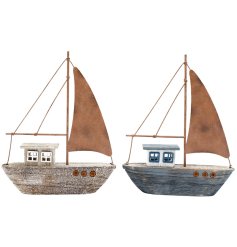 This stunning set of two wooden sails is the perfect addition to any coastal home.