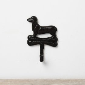 A dog themed wall hook made from cast iron. 
