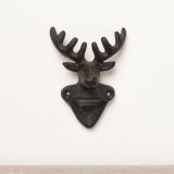A lovely cast iron bottle opener that can be attached to a wall or used as a hand held opener. 