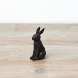 A simplistic rabbit made from cast iron.