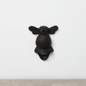 A chic bottle opener made from cast iron in a bumble bee design.