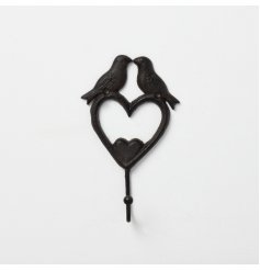 A romantic wall hook featuring two birds sat on-top of a heart.