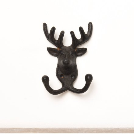 A rustic deer wall hook with two separate hooks. 