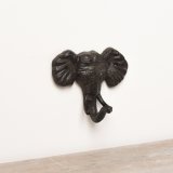 A chic elephant hook made from cast iron with textured detailing and two pre drilled holes for easy hanging. 