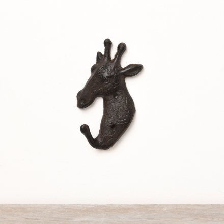 A stylish cast iron wall hook featuring a giraffes head with textured print detailing. 