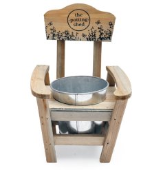 This wooden chair planter holder, featuring the Potting Shed design, is an excellent addition to any garden.