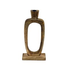 This abstract candle holder made from polished wood is sure to add a hint of style to the home interior. 