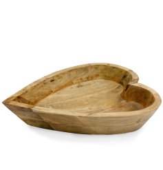 A rustic wooden bowl carved into a heart shape. This item would be perfect for storing keys, jewellery or miscellaneous 