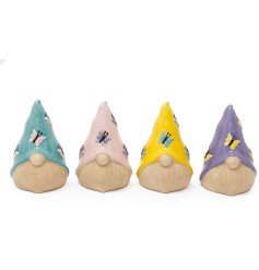 This delightful assortment of 4 ceramic gonks are adorned with pastel hats and is perfect addition to any home.