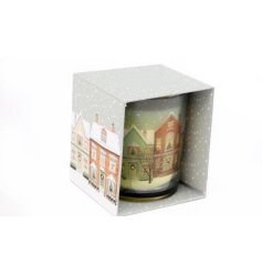 A cute traditional candle with a spiced ginger nutmeg fragrance, displayed in a matching open style box. 