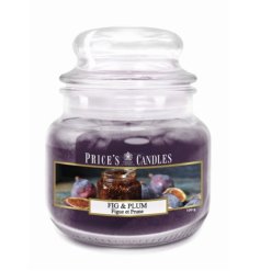 A scented candle from the prices range with a deep purple wax. 