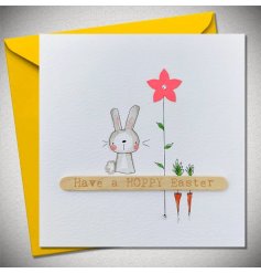 A cute bunny design Easter card, featuring mini carrots and a flower illustration, finished with crystals and a wooden l