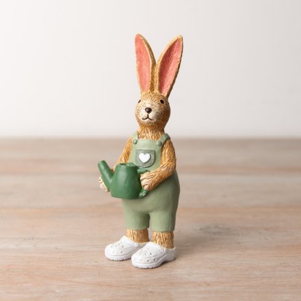 A unique and charming gardening bunny in green dungarees with clogs. 