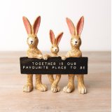 A unique bunny ornament with a sentiment plaque. A stylish interior decoration and gift item. 