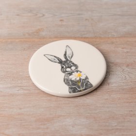 A charming bunny themed coaster made from ceramic with a simple glaze.