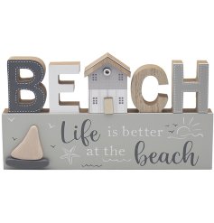 A charming coastal plaque in a natural colour tone with 3D 'beach' wording and scripted text underneath sea themed illus
