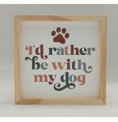 A rustic wooden block sign detailed with dog wording and a paw print symbol.