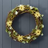 Place this warm and welcoming springtime wreath anywhere in the home