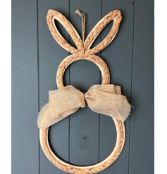 A beautifully crafted wreath shaped like a bunny