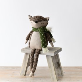 An enchanting fabric-seated fox with long legs and a fluffy tail.