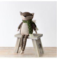 An enchanting fabric seated fox with long legs and a fluffy tail