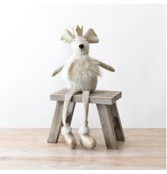A delightful soft fabric sitting mouse with dangle legs. Complete with a fluffy details and gold shoes and crown.