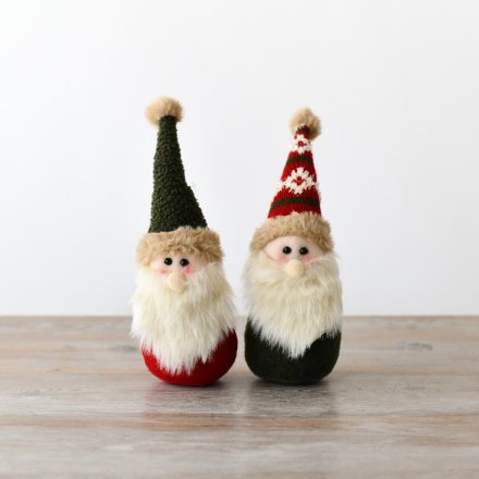 An assortment of 2 adorable little gonks both in a traditional and festive red and green hats