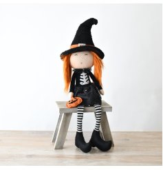 Longed Legged Halloween Witch with Pumpkin