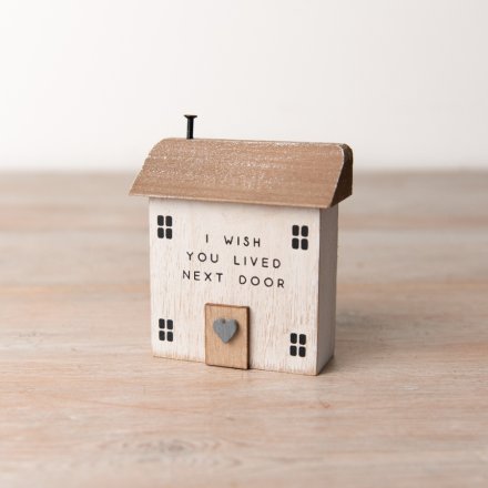 I wish you lived next door. A charming wooden house with a rustic finish and sentiment slogan. 