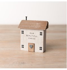 A rustic wooden house ornament with a distressed finish and charming OUR BEAUTIFUL CHAOS slogan. 