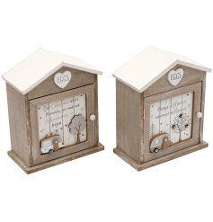 An assortment of two wooden egg houses featuring a homely quote and complete with wooden caravan decals.