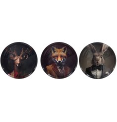A stylish assortment of wall plates with quirky forest animals in suit designs. 