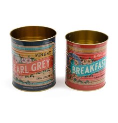 A pair of retro tins featuring vibrant designs, one containing breakfast tea and the other Earl Grey.